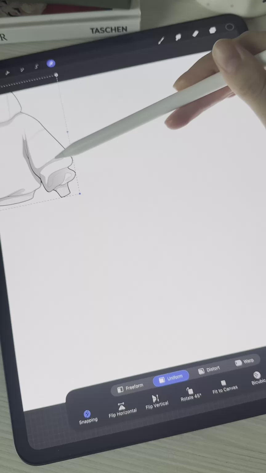 FUPstudio video showing hoodie mockup editing in Procreate, adjusting sleeve details with Apple Pencil, using clothing mockups and Procreate tools for tech pack style streetwear design.